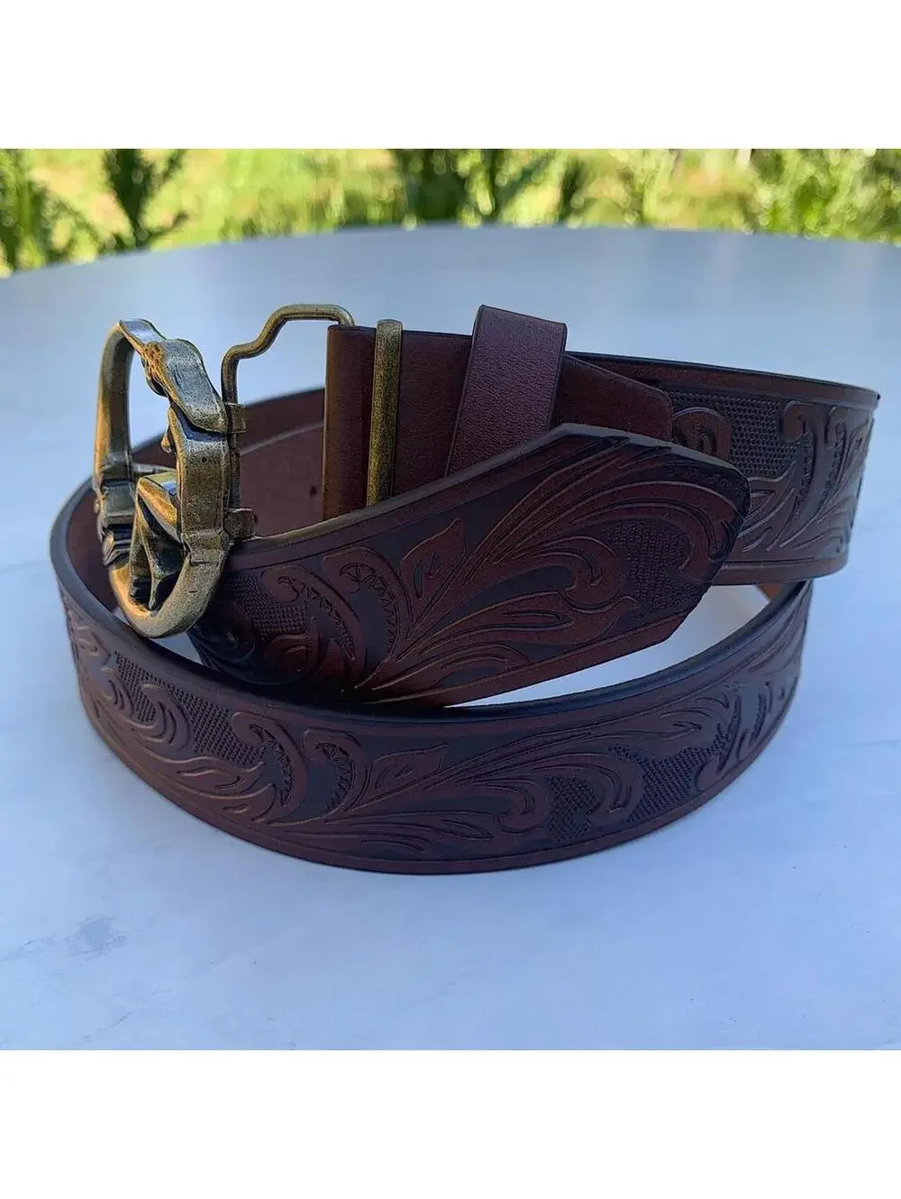 Half moon and Woman belt buckle brown belt. 44 inches length